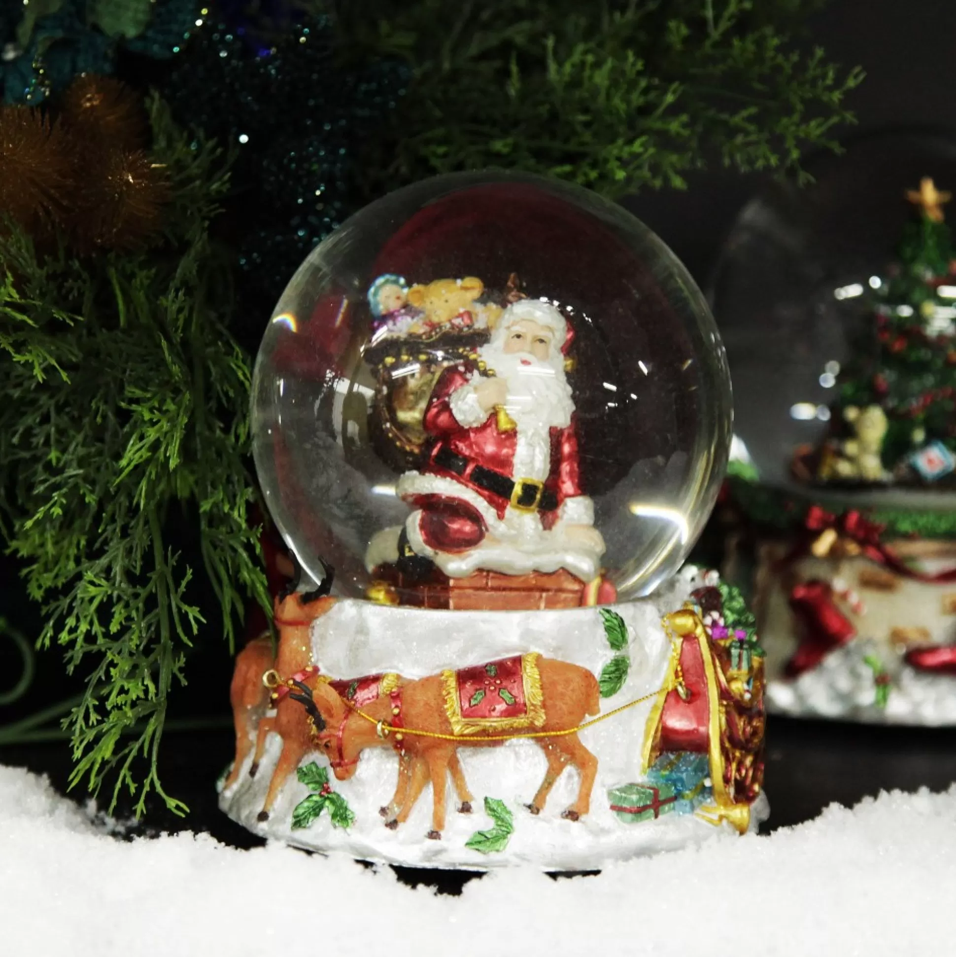 Christmas Musical Snowglobe with Santa and his Reindeers Christmas Snowglobes |